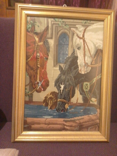Tapestry horses and dog drinking water